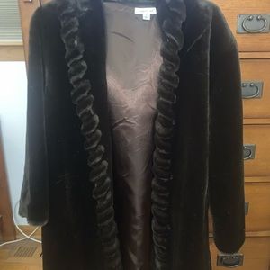 Faux fur ladies mid length coat with hood